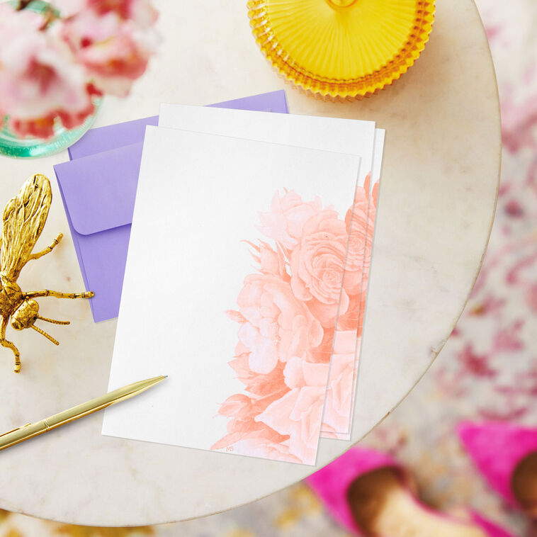 Lavender stationery set with butterfly and floral designs, 40 writing sheets and 20 envelopes in a magnetic storage folio.
