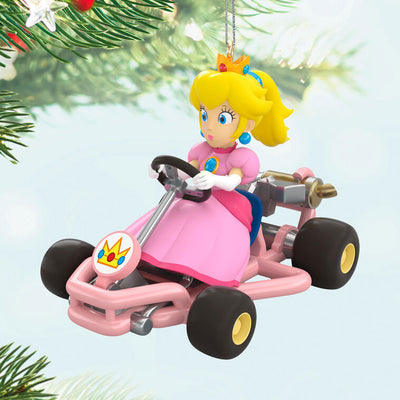 Princess Peach from Mario Kart drives a pink go-kart, wheels turning, Hallmark Keepsake Christmas ornament inspired by the Nintendo video game.