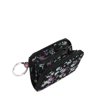 Carry all of your essentials while keeping your credit and debit cards safe with this small wallet. The interior features three card slips and a zip pocket while the exterior includes an ID window and key ring. Details Provides RFID protection for credit and debit cards. Exterior features an ID window. Interior features three card slips and a zip pocket. Key ring. Zip closure. Care Tips Place in mesh bag before laundering; machine wash cold gentle cycle only non-chlorine bleach when needed; lay flat to dry 