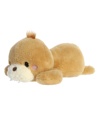 Wully Walrus plush from Aurora’s Too Cute line, lying belly-down with sandy fur, soft tusks, and a gentle smile.