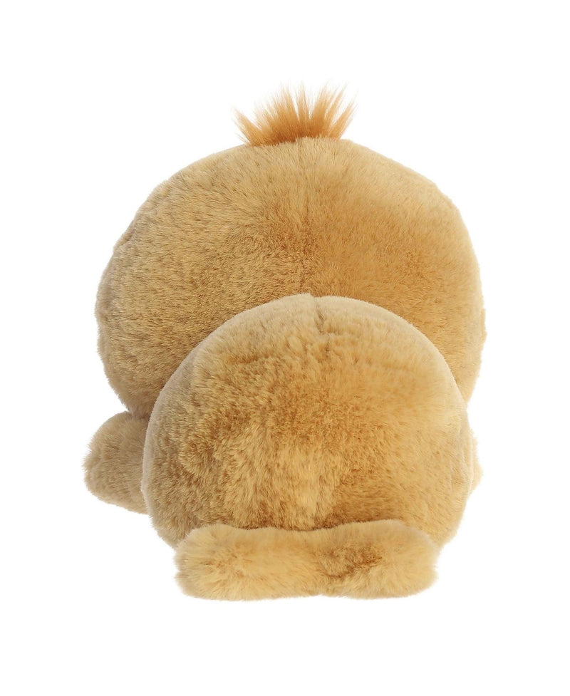 Wully Walrus plush from Aurora’s Too Cute line, lying belly-down with sandy fur, soft tusks, and a gentle smile.