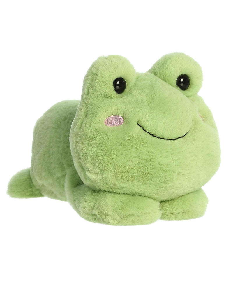 Fovo Frog plush toy from Aurora’s Too Cute collection, lying belly-down with big eyes, green fabric, and blushing cheeks.