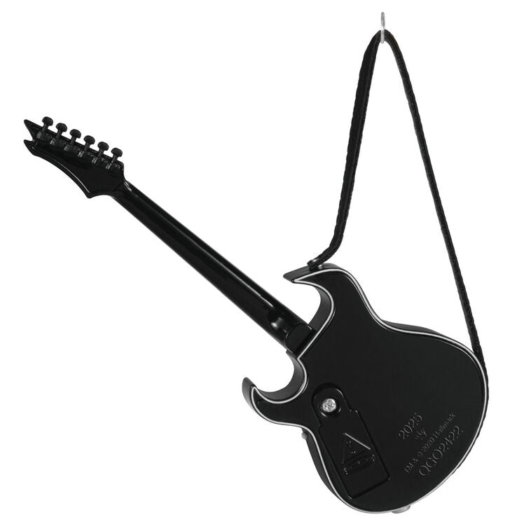 Red and black electric guitar Christmas ornament that plays “Street Fighting Man” by The Rolling Stones, battery operated

