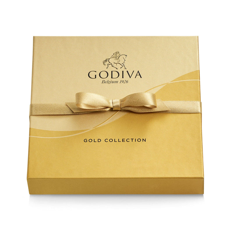 A 9-piece Godiva chocolate gift box in gold with ribbon, featuring assorted milk, dark, and white chocolates in rich, creamy, and crunchy flavors.

