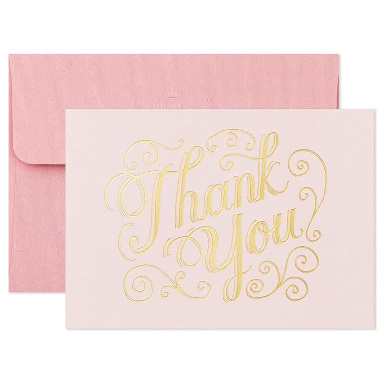 Assorted whimsical note cards with gold foil accents in multiple designs, includes envelopes and reusable caddy.