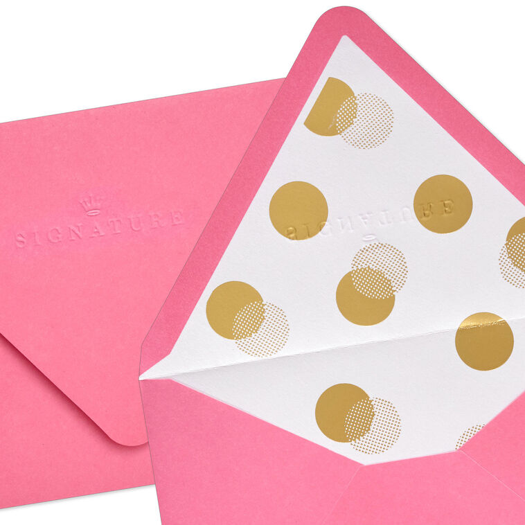 Bright pink envelopes with gold and white halftone dot design inside the flap and pointed edges.
