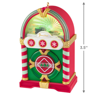 Retro jukebox Christmas ornament with lights and sound, plays three classic holiday tunes, battery operated

