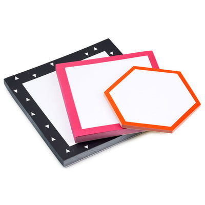 Set of three memo pads with pink, black, and orange borders in square and hexagonal shapes, arranged in a stack.
