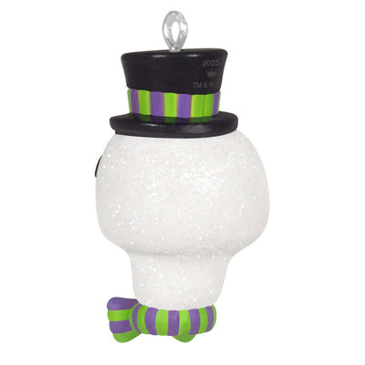Mini Halloween skull ornament wearing sparkly top hat and bow tie with purple and green accents


