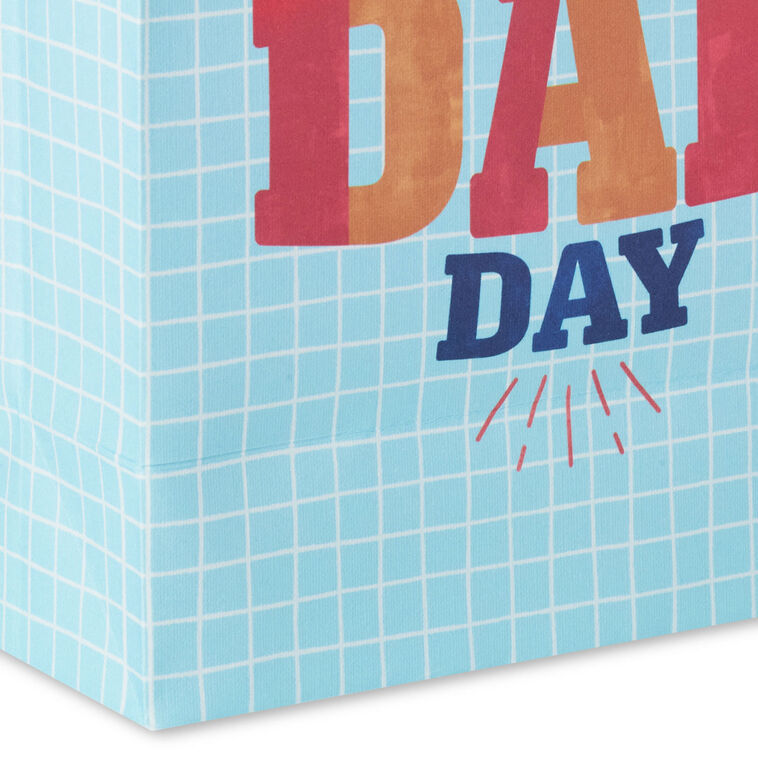 Light blue small gift bag with white grid pattern and bold &