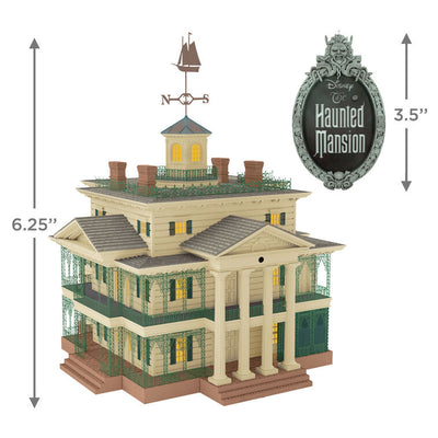 Disney Haunted Mansion tree topper with synchronized light and sound show, remote control activation, and glowing Disney