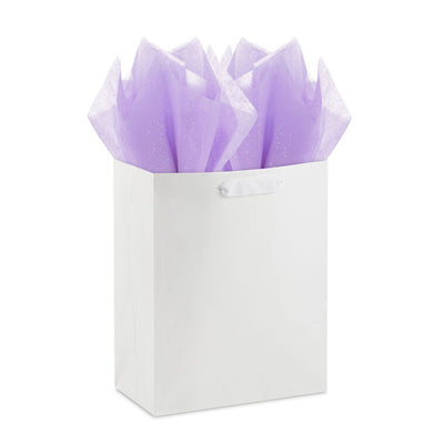 Hallmark amethyst tissue paper with iridescent dots, shown folded, styled in a gift bag, and displayed flat to highlight the shimmer.