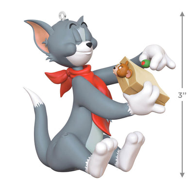 Tom and Jerry Christmas ornament with Tom holding a sandwich and Jerry peeking out, red napkin around Tom's neck