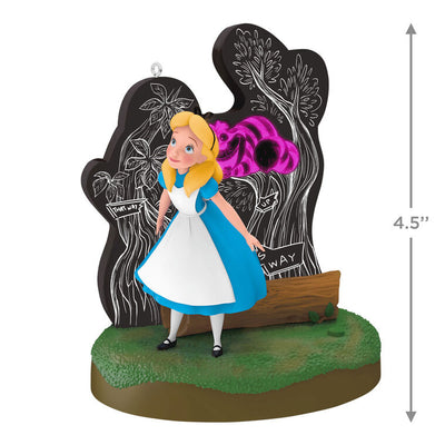 Alice stands in Wonderland before a glowing tree as the Cheshire Cat fades in and out in this Hallmark Keepsake Disney ornament.
