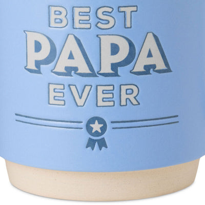 Bright blue ceramic mug with "Best Papa Ever" text, blue ribbon design, oversized handle, and recessed base for stacking.