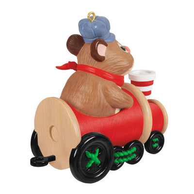 Hallmark Keepsake Cute as a Button ornament—hamster on red train engine with spools of thread, black button wheels, striped smokestack made of buttons
