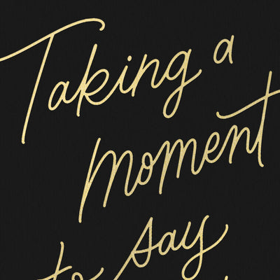 Black thank-you cards with elegant gold foil script reading “Taking a moment to say thanks.”
