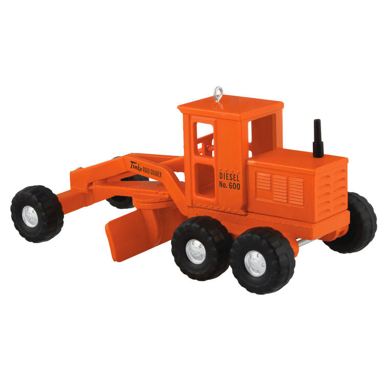 Hallmark Keepsake Hasbro Tonka Road Grader ornament, orange die-cast metal construction vehicle toy with turning wheels, vintage-style design.