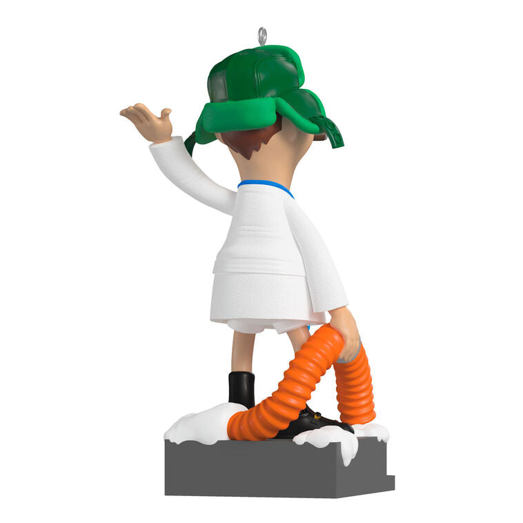 Cousin Eddie ornament from Hallmark Keepsake, wearing a bathrobe and trapper hat, standing next to an RV toilet from National Lampoon&