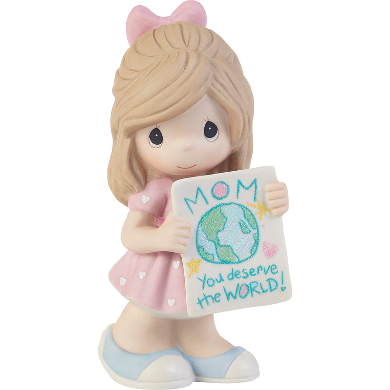 Girl figurine in pink dress holding colored drawing for mom, sculpted in bisque porcelain by Precious Moments.