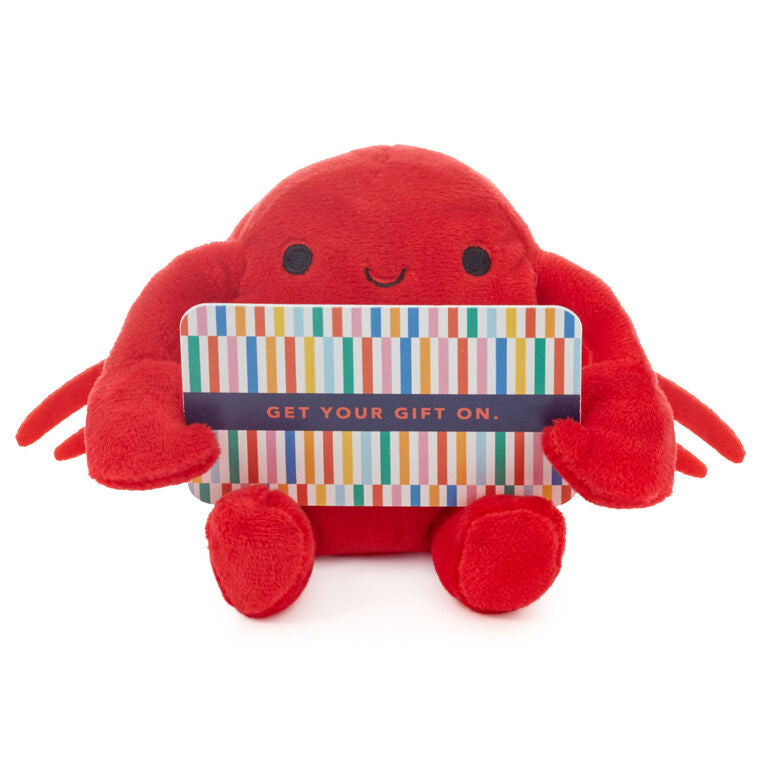 Smiling red plush crab with wire claws holding a gift card, perfect for fun gift presentation.

