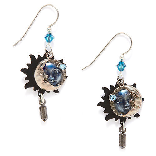 Blue Eclipse layered earrings with moon and sun discs, beads, and Swarovski crystals on surgical steel hooks.
