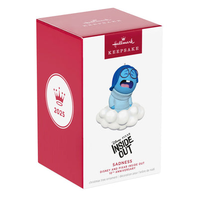 Hallmark Keepsake Inside Out 10th Anniversary Sadness ornament with Sadness sitting on a white cloud, Disney/Pixar Christmas decoration.