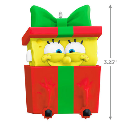 SpongeBob SquarePants ornament, yellow character in red gift box with green bow, Hallmark Keepsake, Christmas tree decoration.
