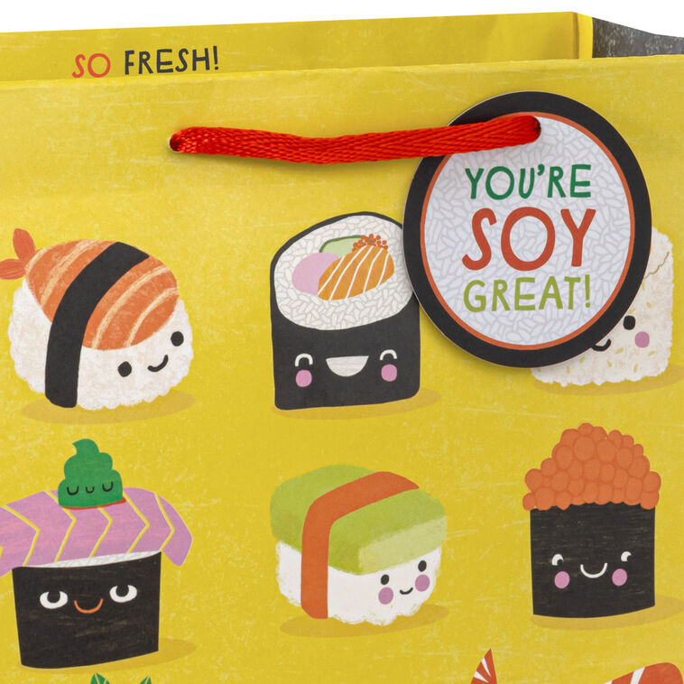 Hallmark medium gift bag with smiling sushi characters and pun text on a yellow background, perfect for fun gift occasions.