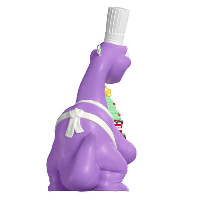 Purple Brachiosaurus in chef’s hat and apron holds a candy cane cake in this festive Hallmark Keepsake Christmas dinosaur ornament.