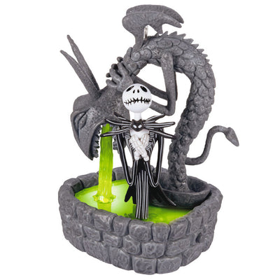 Jack Skellington in Halloween Town fountain ornament with glowing green light from The Nightmare Before Christmas.

