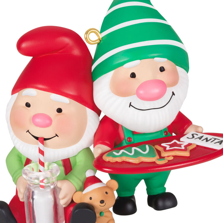 Hallmark Keepsake Gnome for Christmas ornament—two gnomes in red and green hats and overalls, with cookies for Santa and mug of milk, festive scene
