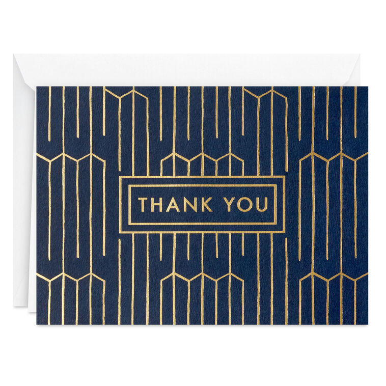 Navy blue thank-you cards with gold foil geometric lines and matching envelopes in kraft box.
