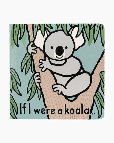 Photo of a koala joey in a eucalyptus tree. 