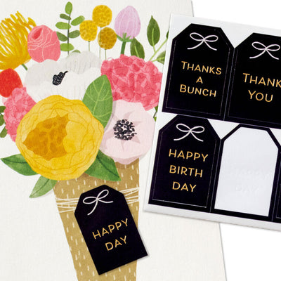 Blank note cards with floral vase illustration and customizable black gift-tag stickers, packaged in kraft wrap.
