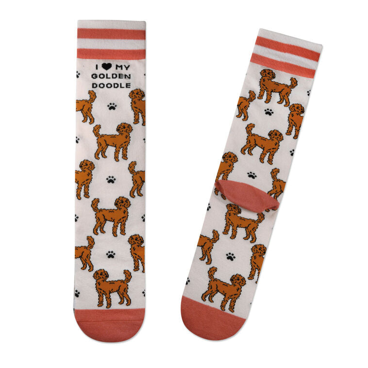 Hallmark crew socks with Goldendoodle dog illustrations, orange paw prints, and striped cuffs.