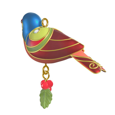 Painted Bunting miniature Christmas tree ornament with colorful feathers, metallic gold trim, and dangling holly berry charm