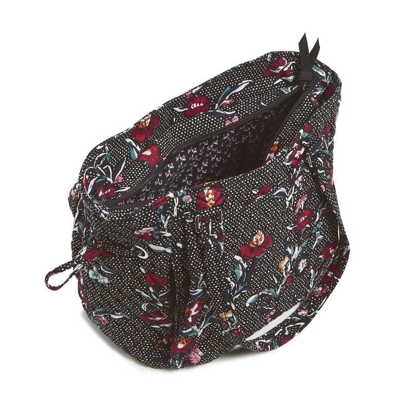 Black floral patterned Glenna Satchel with multiple exterior and interior pockets and adjustable drawstring
