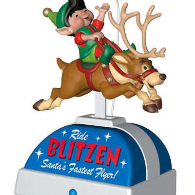 Elf riding Blitzen the reindeer musical ornament with motion, playing "William Tell Overture" holiday keepsake.

