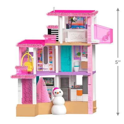 Barbie Dreamhouse ornament, three-story pink house with rooftop studio, Christmas lights, and snowman, Hallmark Keepsake musical decoration.