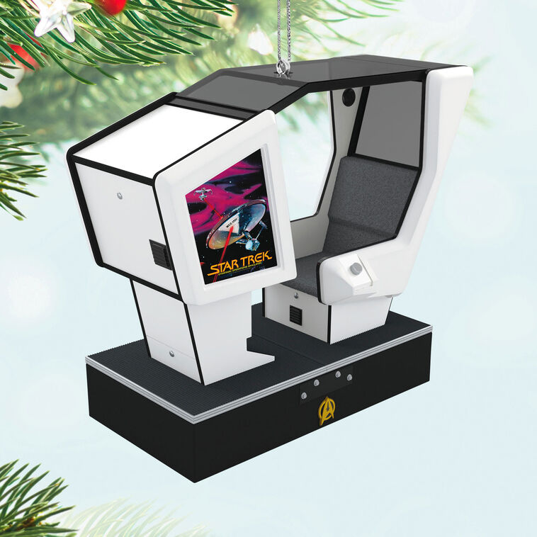 Hallmark Star Trek arcade game ornament—miniature 1980s simulator cabinet with screen, joystick, and seat, lights and sound