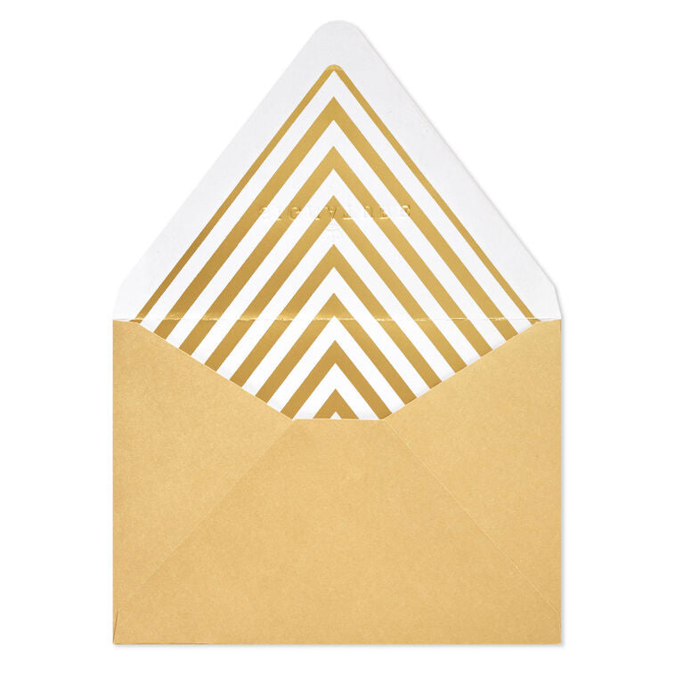 Gold metallic envelopes with white and gold chevron liner and pointed flaps, perfect for cards and special occasions.

