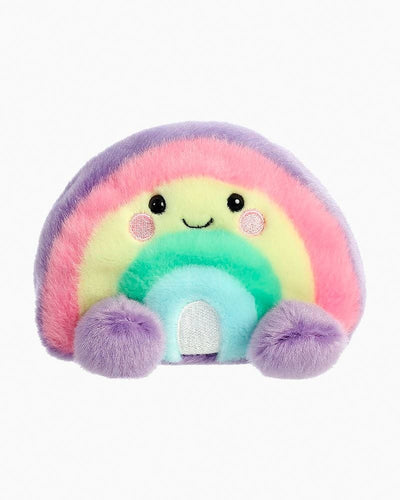Stuffed rainbow toy with stitched smile and colorful stripes. 