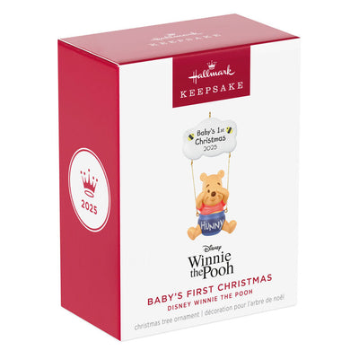 Winnie the Pooh Christmas ornament swinging under a "Baby’s 1st Christmas 2025" cloud with hunny pot and bee accents