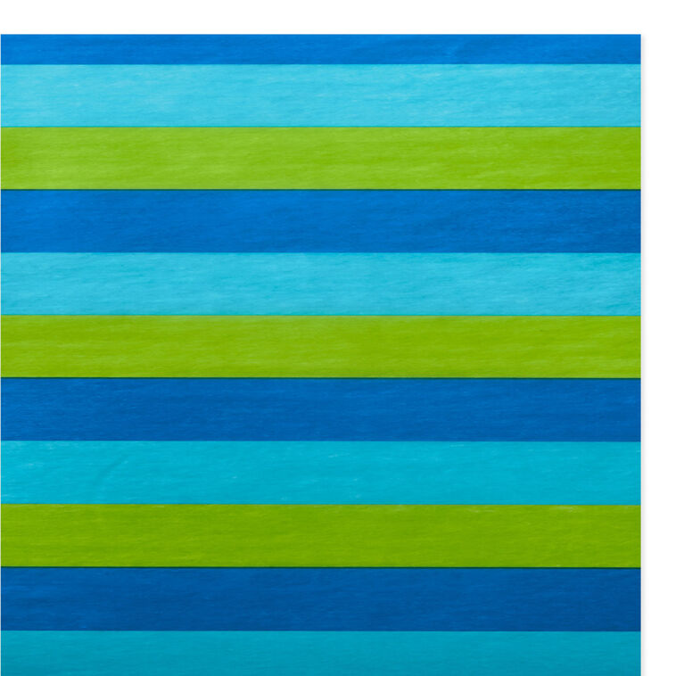 Hallmark tissue paper in bold horizontal stripes of royal blue, aqua, and green, shown both flat and fluffed in a white gift bag.