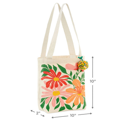 Hallmark 10.5-inch wildflowers fabric gift bag with retro floral design and pom-pom
