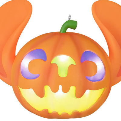 Light-up Halloween ornament of Stitch-shaped jack-o'-lantern from Disney's Lilo & Stitch with glowing face