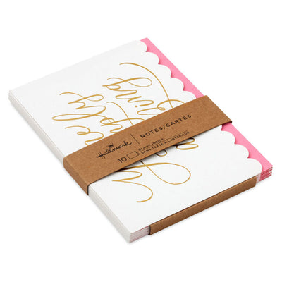 White note cards with gold foil script and scalloped pink edge, bundled in kraft paper wrap.
