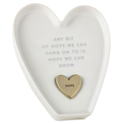 White heart-shaped Hallmark trinket dish with “Hope” engraved token and gray inspirational message.