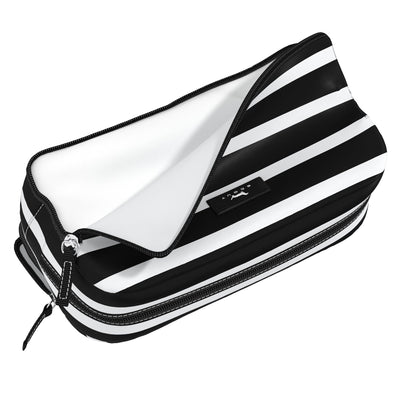 Late Bloomer 3-Zip toiletry bag with three compartments for organizing toiletries, makeup, or school supplies; stands upright.